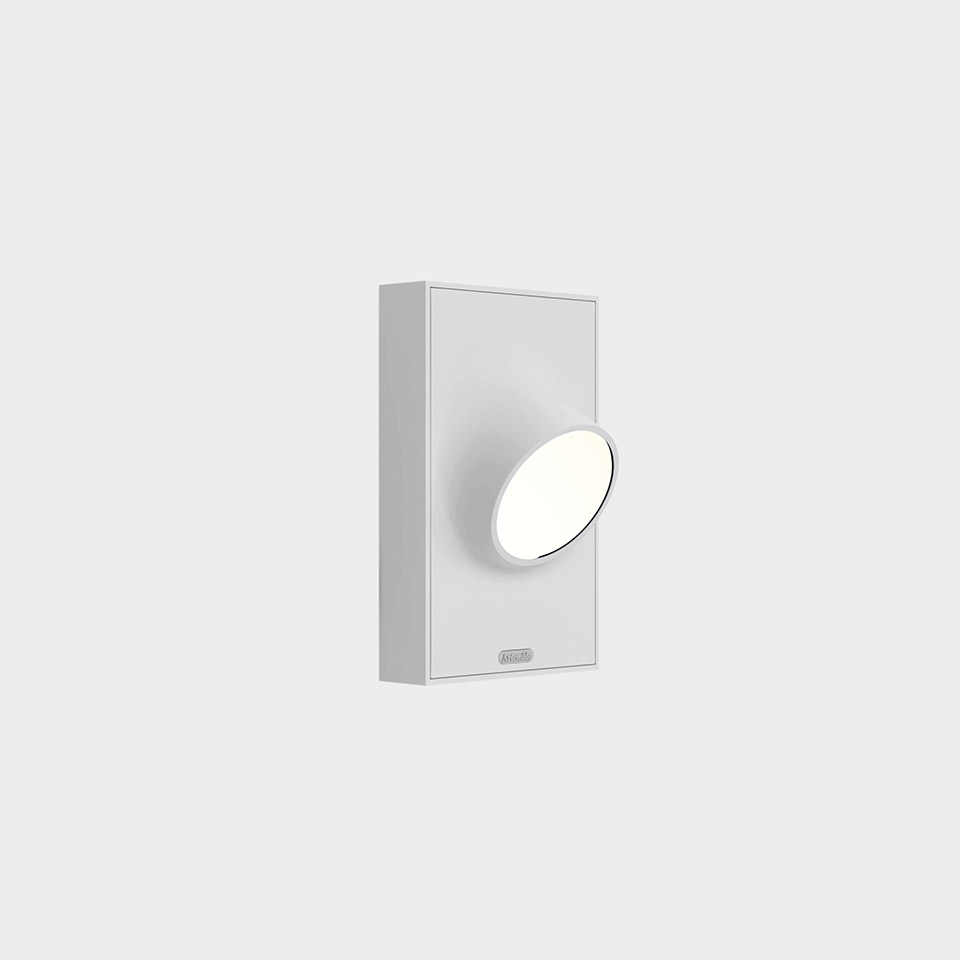 Artemide Ciclope wall lamp: white rectangular body with a rotatable circular LED diffuser, minimalist design