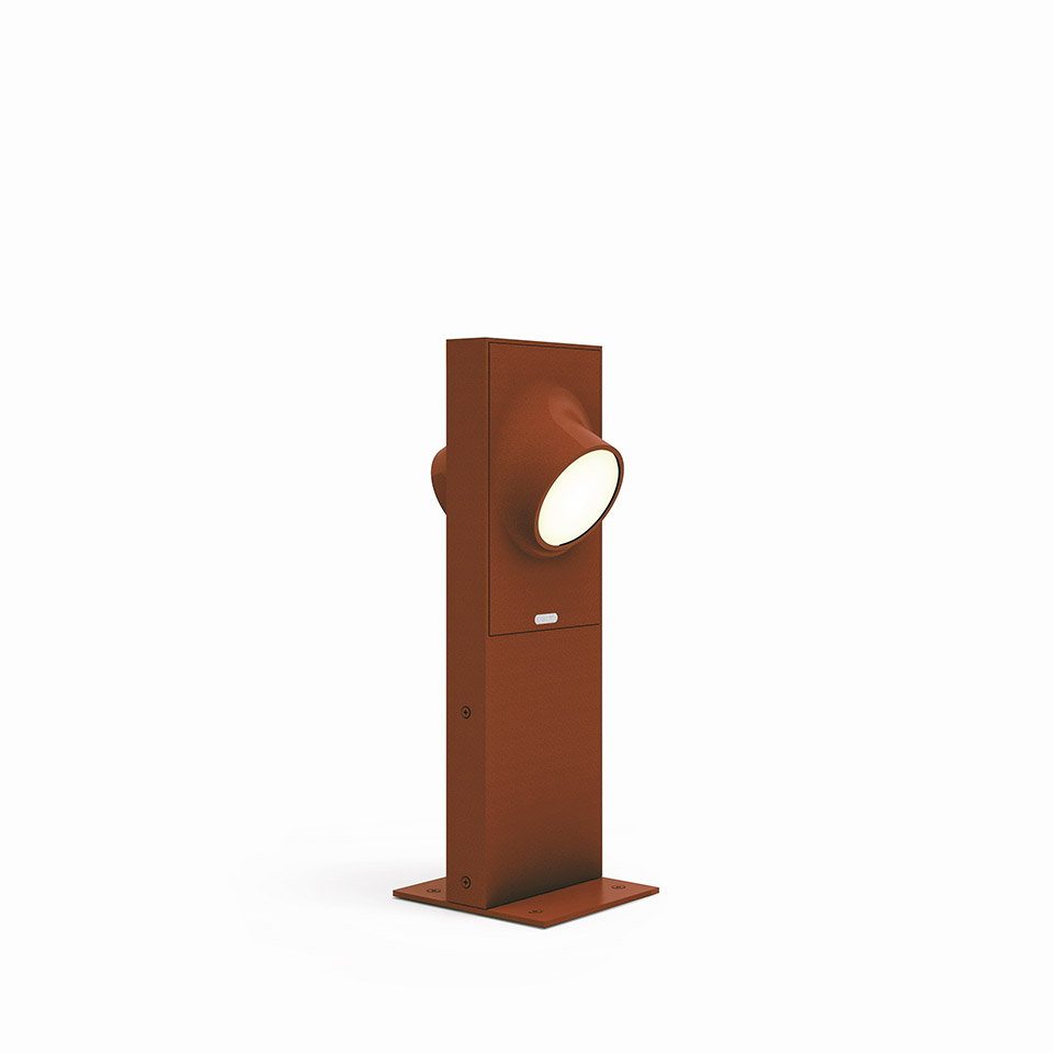 Artemide Ciclope outdoor bollard light in corten red finish, square post with single adjustable circular LED head on base plate