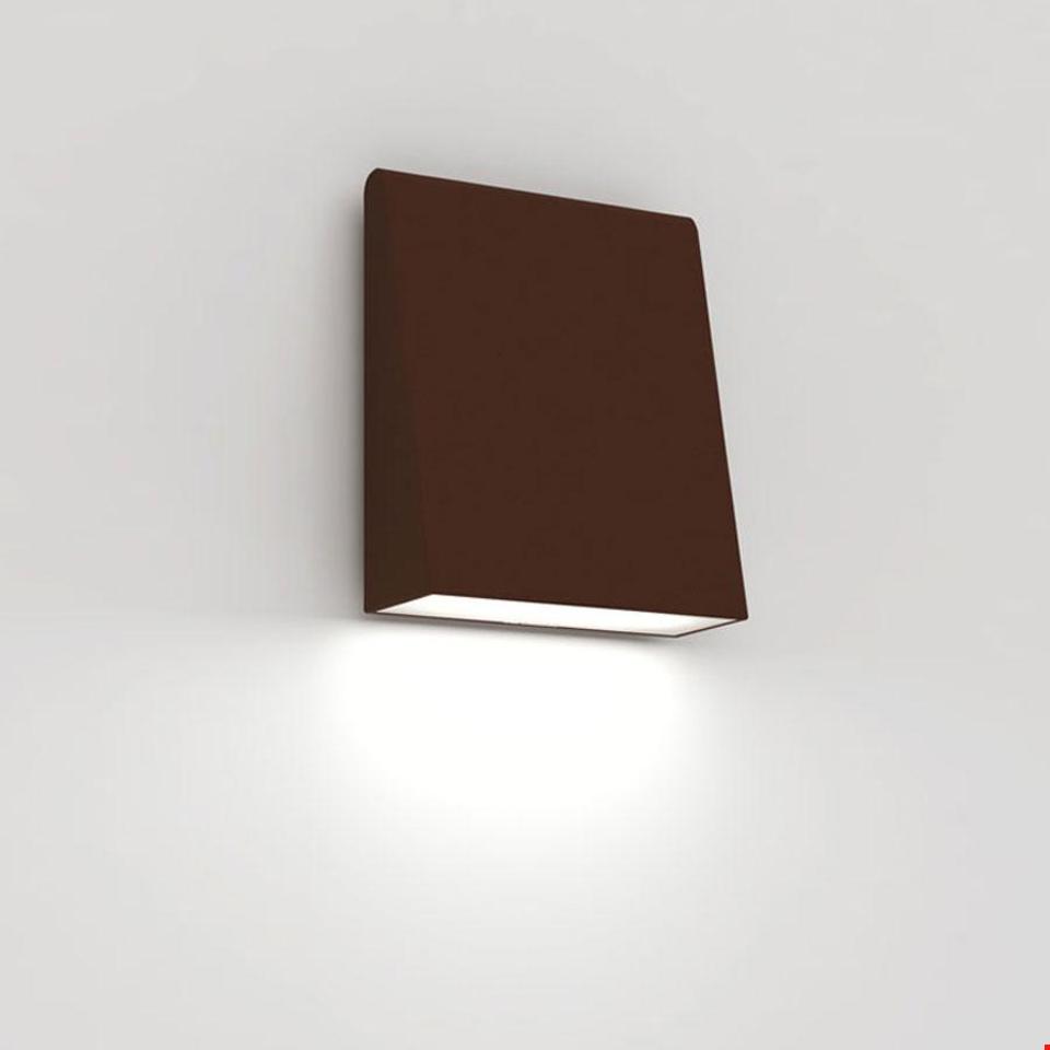 Artemide Cuneo wall lamp in dark brown finish, rectangular shape, emitting warm white light downward from bottom aperture