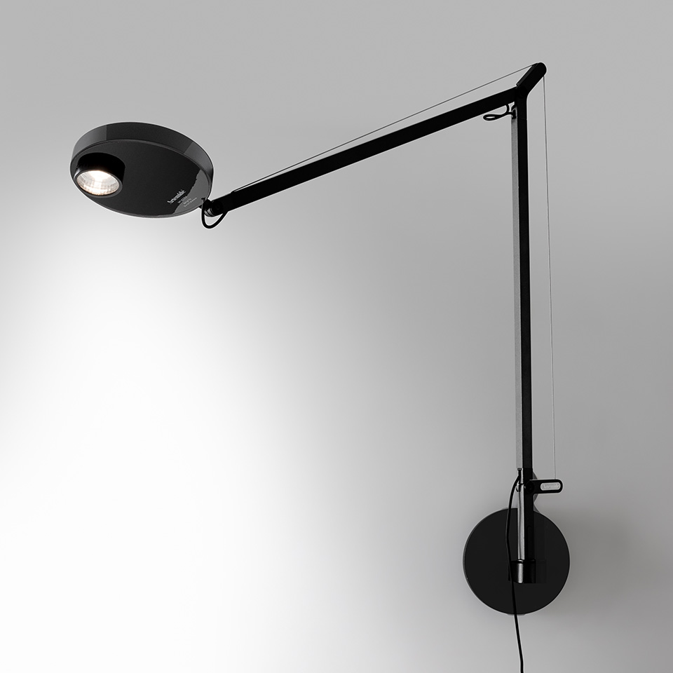 Artemide Demetra Professional wall lamp in black, featuring an adjustable arm with tension cable and circular LED head