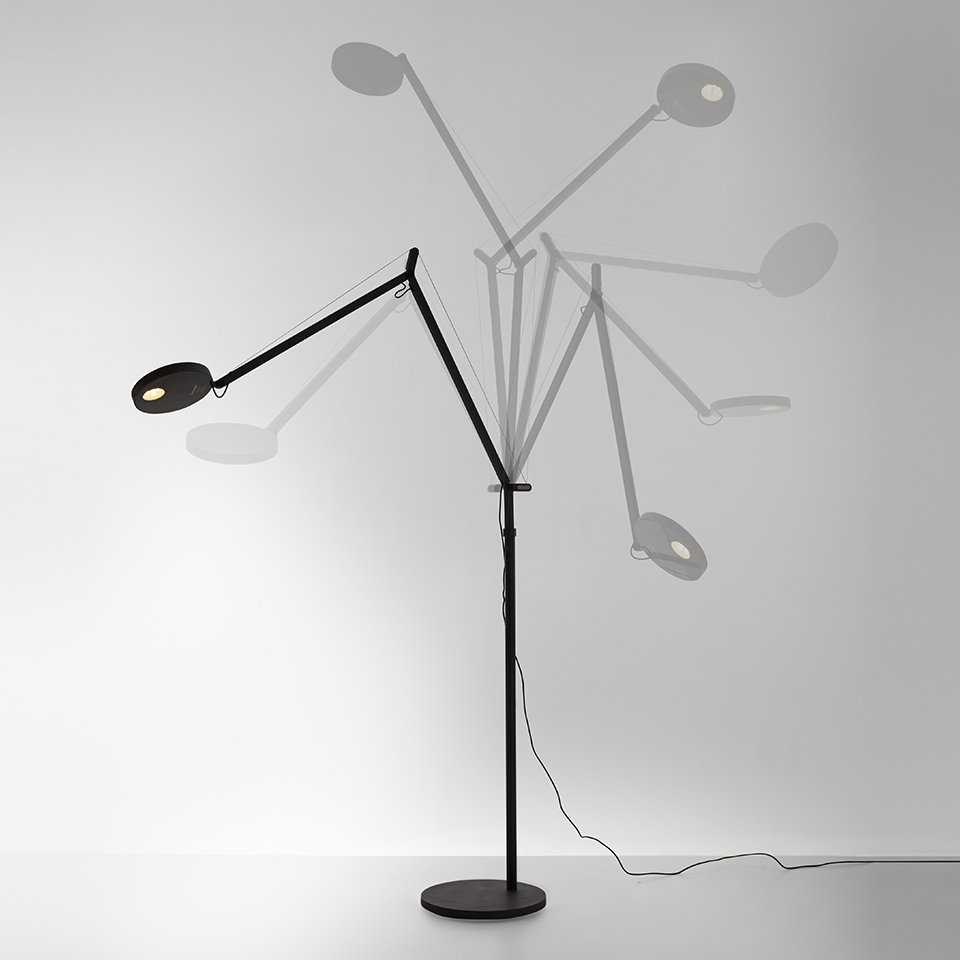 Artemide Demetra Reading Floor lamp in black, adjustable articulated arm with oval LED head, shown in multiple positions
