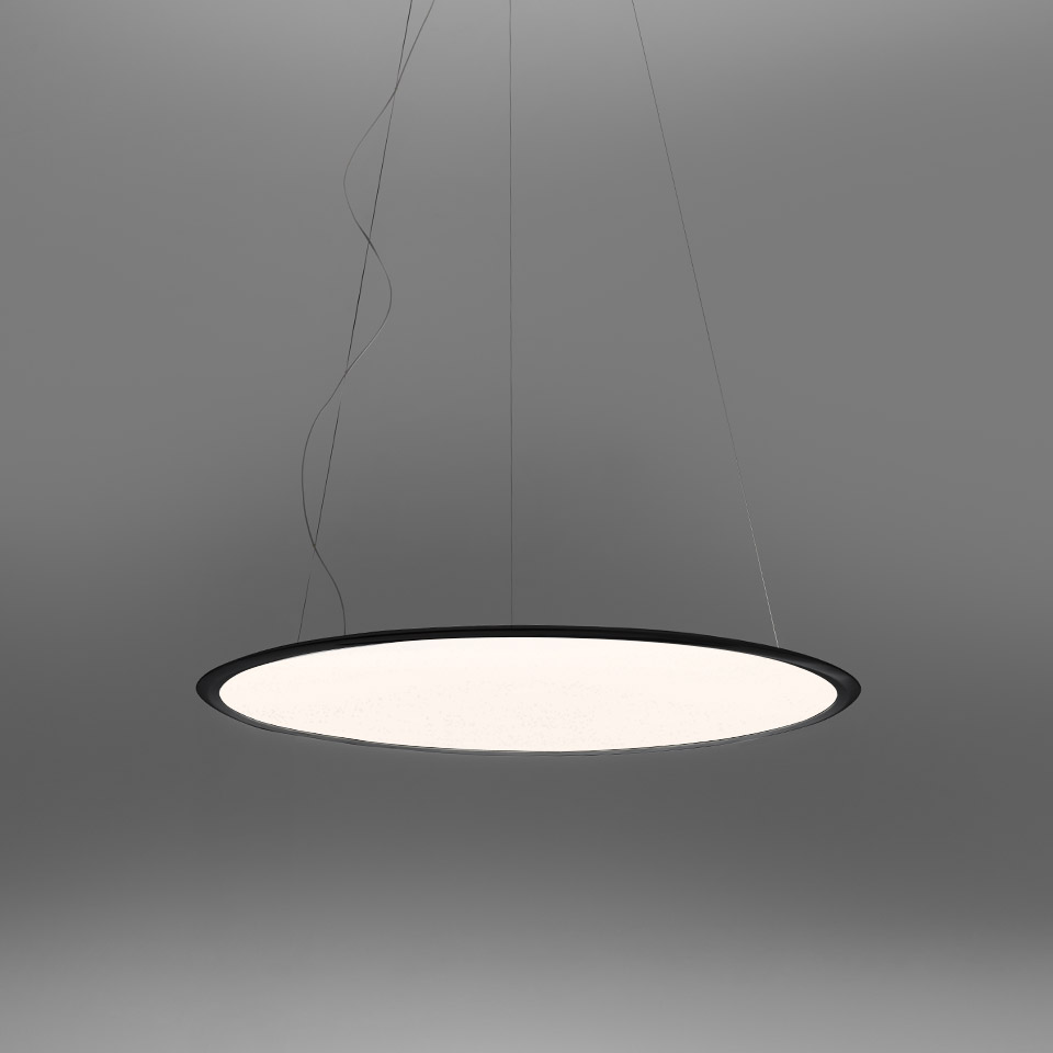 Artemide Discovery pendant lamp: large circular disc with white diffuser and slim black frame, suspended by thin cables