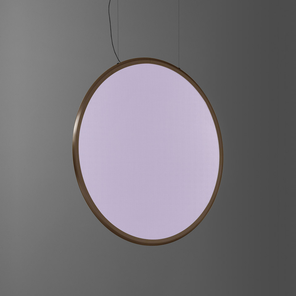 Artemide Discovery pendant lamp: large circular disc with bronze ring frame emitting soft violet-pink light, suspended by thin cable