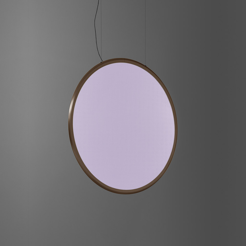 Artemide Discovery Vertical pendant lamp: large circular diffuser emitting soft lavender light, suspended by thin cable with bronze frame