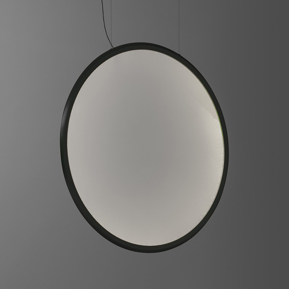 Artemide Discovery pendant lamp: large circular black frame with opal white diffuser, suspended by thin cables, emitting soft uniform light