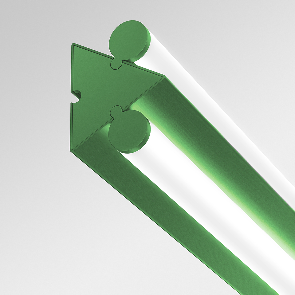 Close-up of Artemide Dreispitz green linear LED lamp, showing triangular connector joint with puzzle-shaped interlocking mechanism