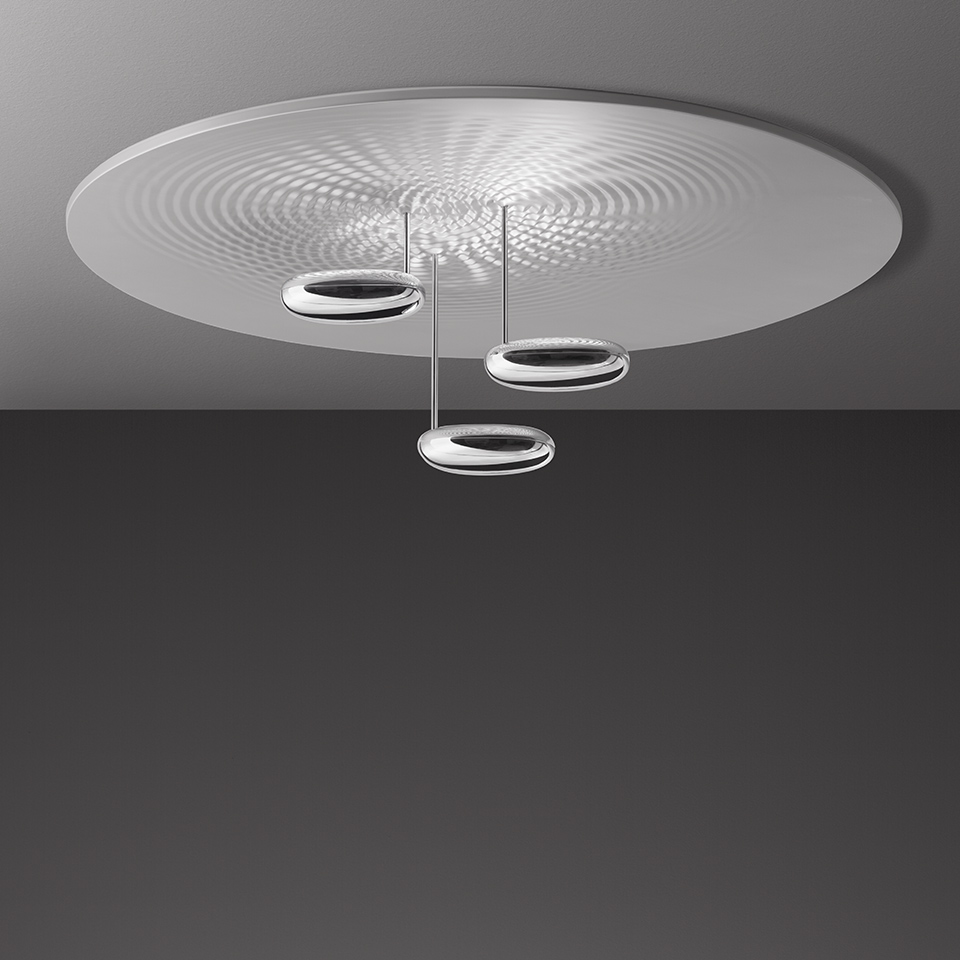 Artemide Droplet ceiling lamp: three chrome ring pendants on steel cables projecting concentric ripple light pattern on white disc
