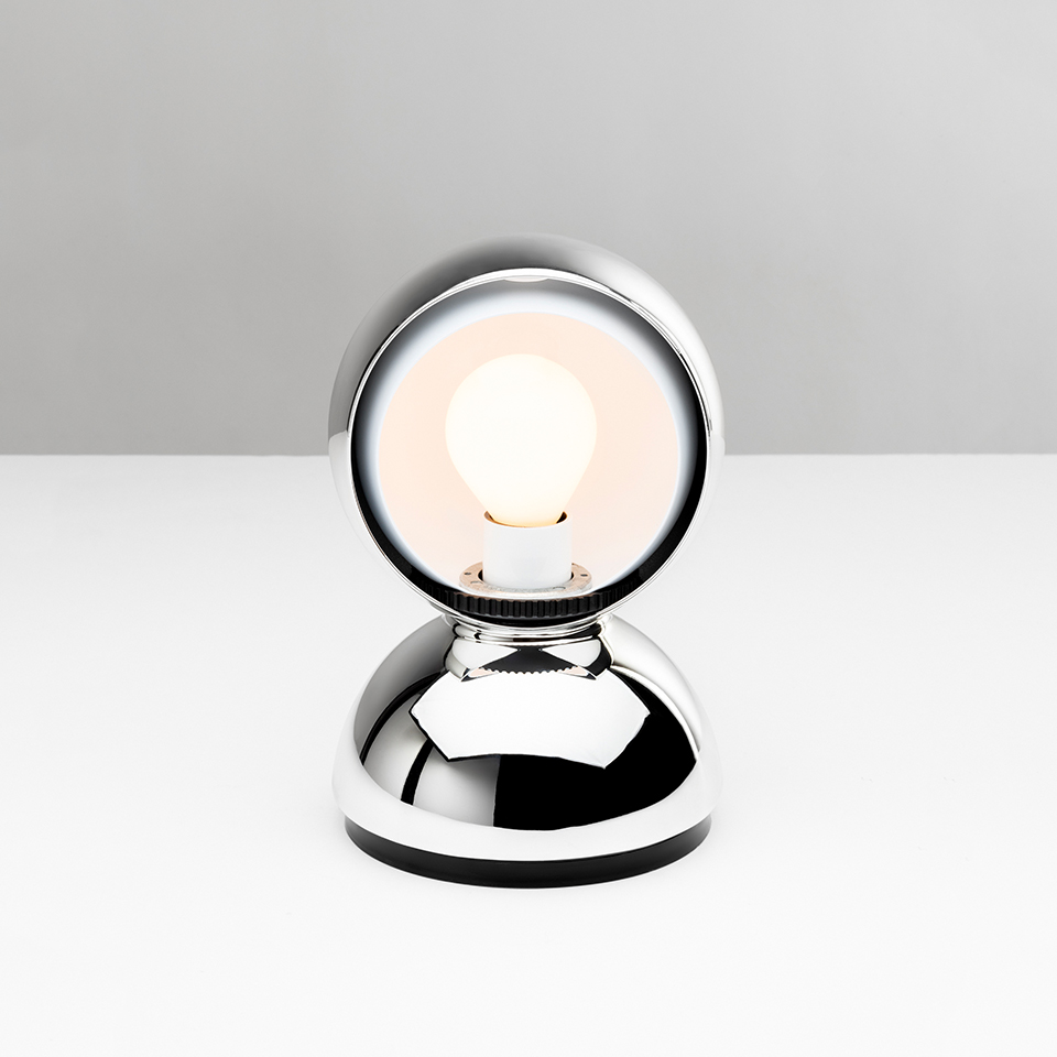 Artemide Eclisse table lamp in chrome finish, featuring a spherical diffuser revealing a frosted bulb, mounted on a rounded base - 2