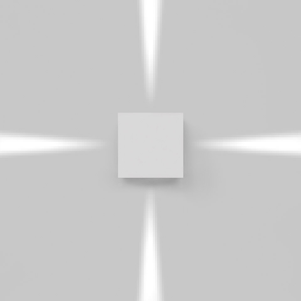 Artemide Effetto wall light emitting four narrow beams of light upward, downward, and sideways on a white wall