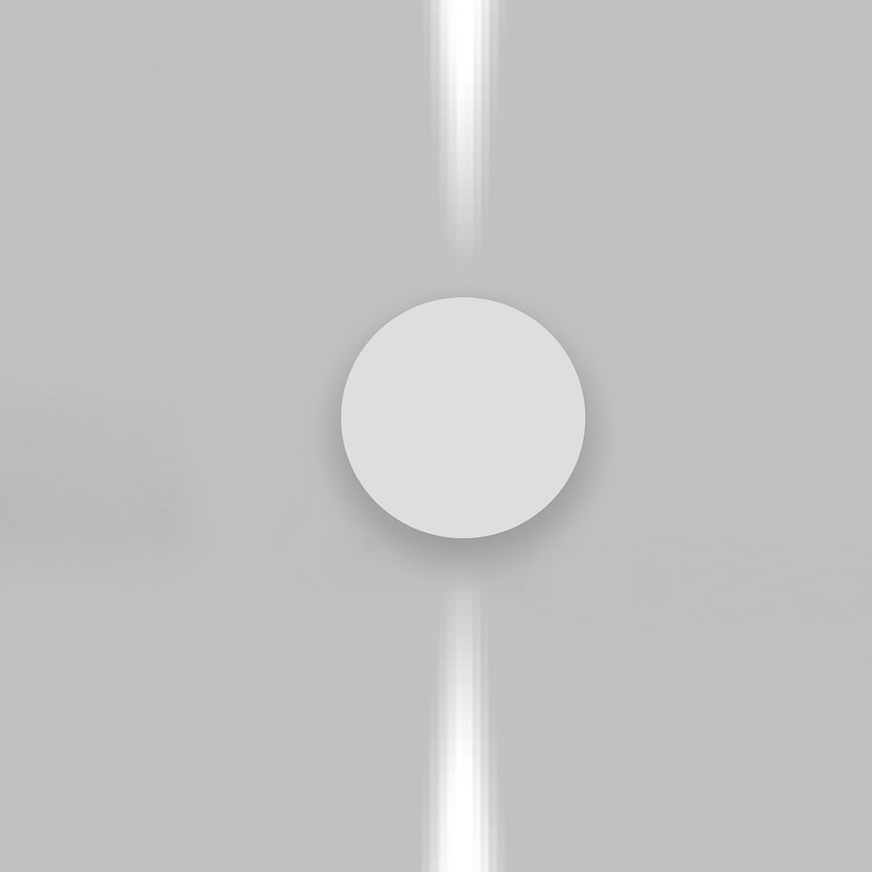 Artemide Effetto wall lamp with circular white diffuser emitting two vertical beams of light upward and downward