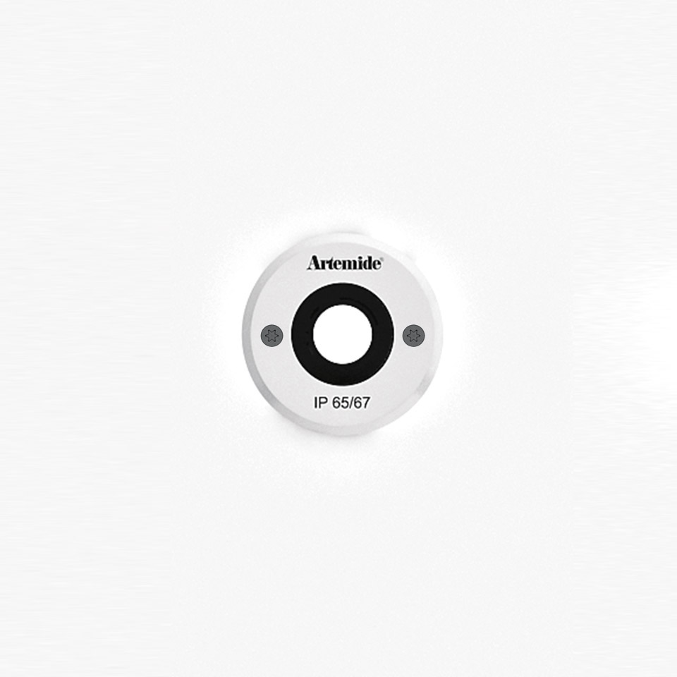 Artemide Ego 55 walk-over recessed light, white circular housing with central lens, IP65/67 rated for outdoor use