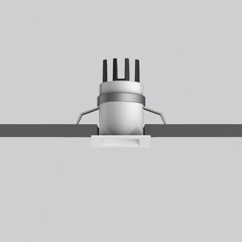 Artemide Everything 35 recessed spotlight, square white trim flush-mounted in ceiling, with adjustable cylindrical body and heat dissipator fins