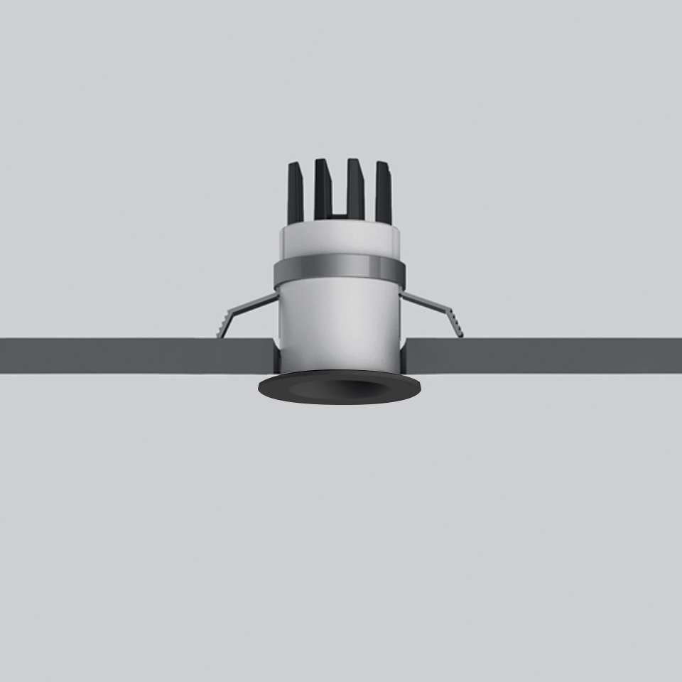 Artemide Everything 35 recessed downlight, white cylindrical body with heat sink fins, dark round aperture, flush ceiling mount