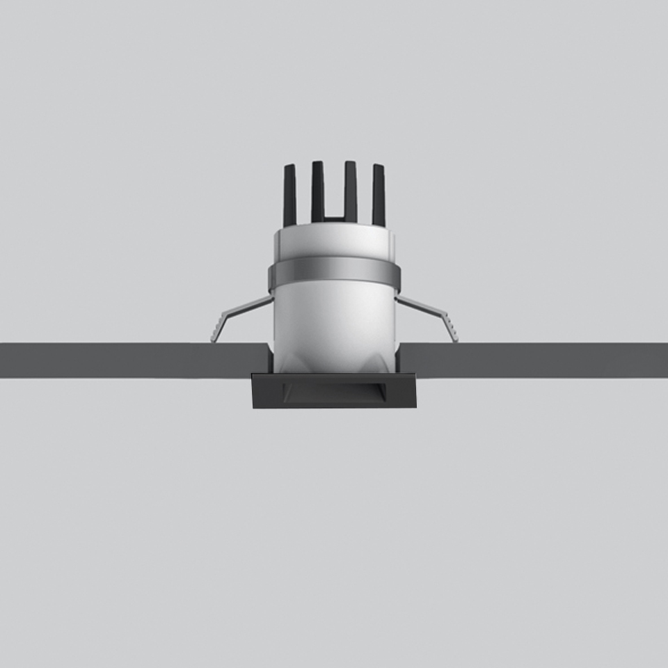 Artemide Everything 35 recessed downlight with square trim, cylindrical white body, heat sink fins, and adjustable mounting brackets