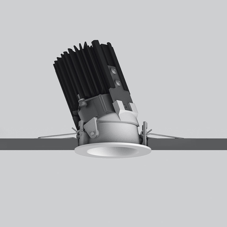 Artemide Everything 55 recessed LED downlight with adjustable tilting mechanism and black heat sink fins, white trim ring