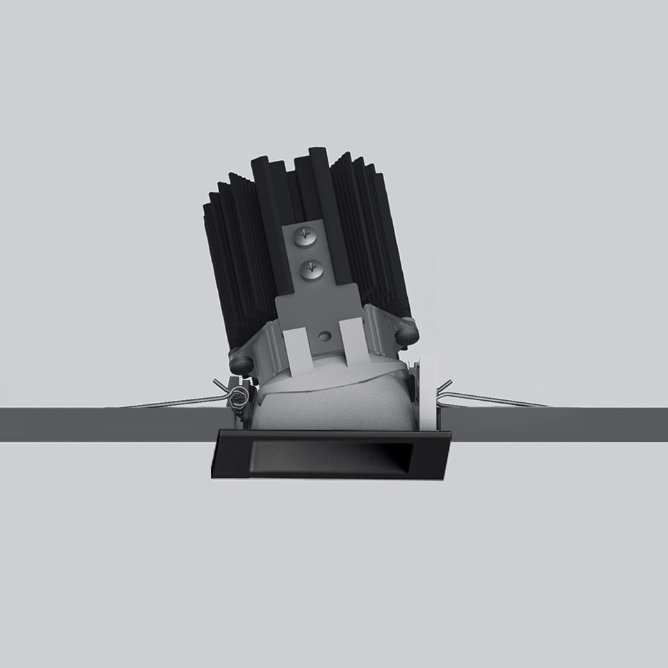 Artemide Everything 55 recessed spotlight, black square trim, tilted LED module with heat sink fins, spring-clip mounting system