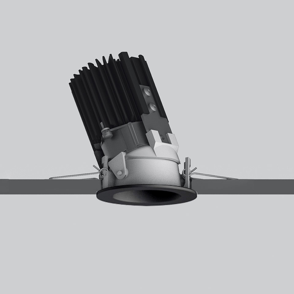 Artemide Everything 55 recessed spotlight, black adjustable LED module with heat sink fins, mounted in ceiling with spring clips