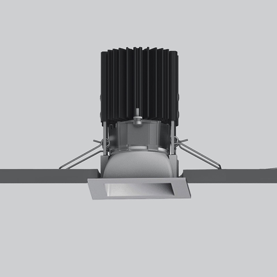 Artemide Everything 55 square recessed LED downlight in grey, with black finned heat sink and adjustable mounting brackets