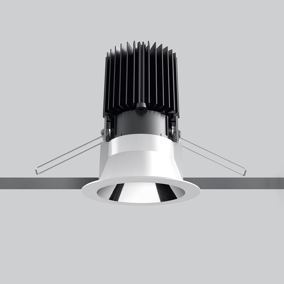 Artemide Everything 80 Trim recessed LED downlight with white trim ring, chrome reflector, and black heat sink fins