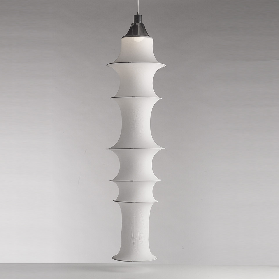 Falkland Sospensione pendant lamp by Artemide: tall white fabric diffuser with stacked hourglass-shaped sections on a metal suspension - 2