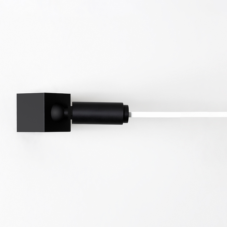 Artemide Funivia wall lamp: black square wall mount with cylindrical joint extending a slim white horizontal light bar