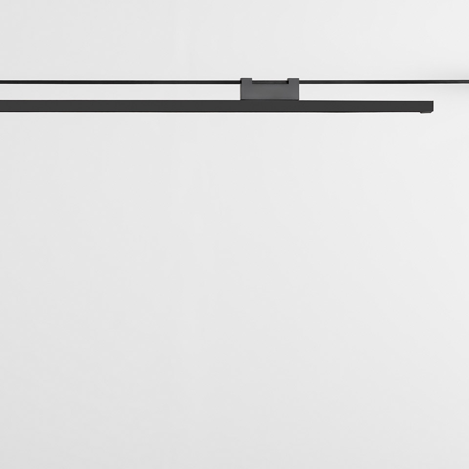 Artemide Funivia: slim black linear LED ceiling fixture with central mounting bracket, minimalist design for indoor use