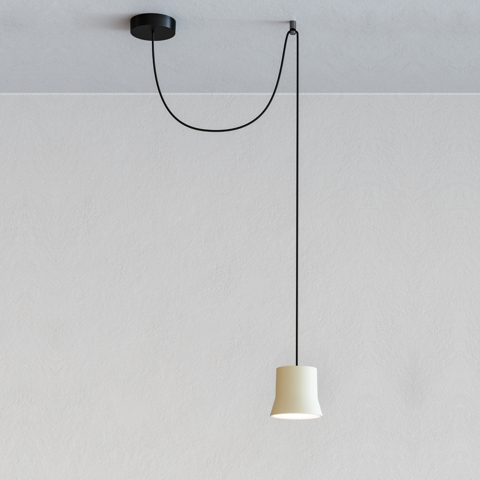 Artemide Giò Light Decentrata pendant lamp: cream truncated cone shade on long black cord with offset black ceiling canopy