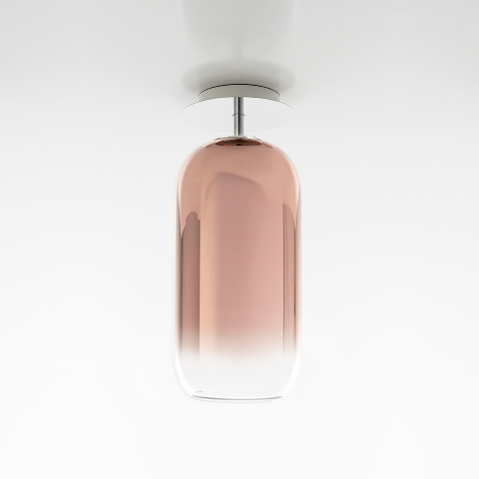 Artemide Gople ceiling lamp with capsule-shaped blown glass diffuser in gradient rose-pink, mounted on chrome stem