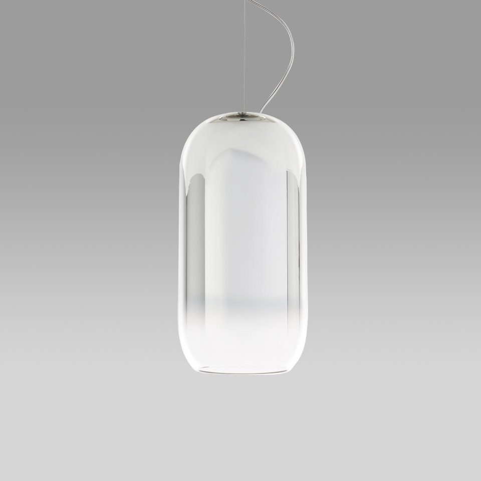 Artemide Gople pendant lamp: tall cylindrical blown glass shade, transparent outer layer with white opal inner diffuser, suspended by thin cable