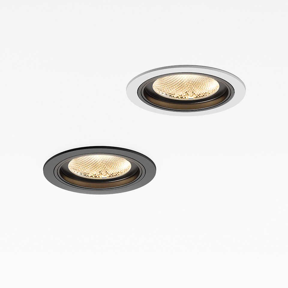 Two Artemide Hoy Spot recessed LED downlights: one black and one white trim, both with warm-toned honeycomb lens. - 2