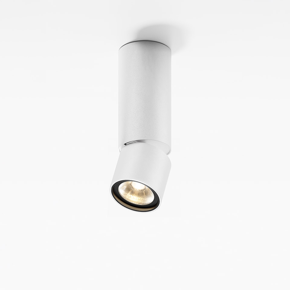 Artemide Hoy Spot SMD: white cylindrical ceiling spotlight with adjustable head and warm LED light source