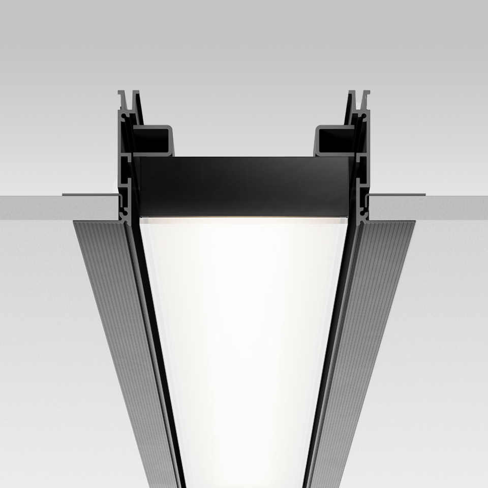 Artemide Hoy System Recessed ceiling light: cross-section view of black aluminium recessed profile with diffused white LED light emission