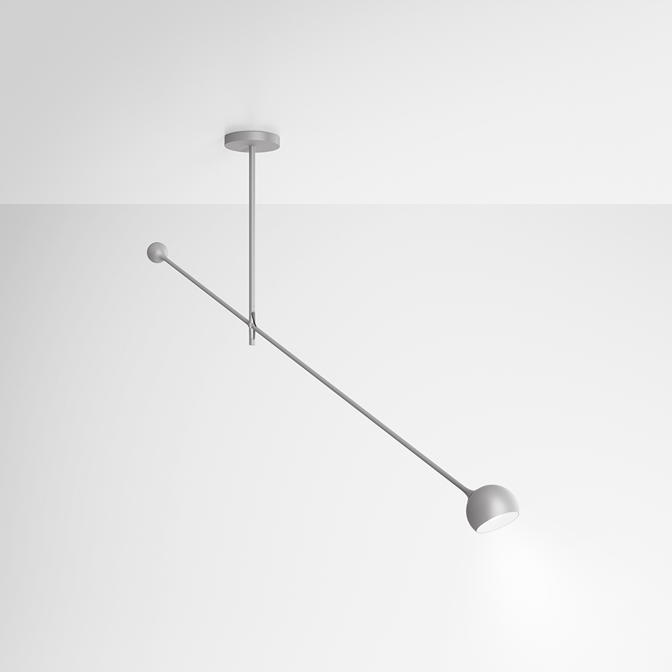 Artemide Ixa ceiling lamp: long diagonal gray arm with small counterweight and adjustable spherical head, ceiling-mounted