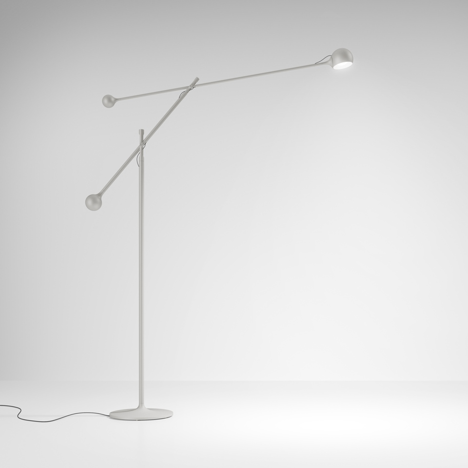 Artemide Ixa floor lamp in white, featuring an adjustable counterbalanced arm with small sphere counterweight and directional LED head