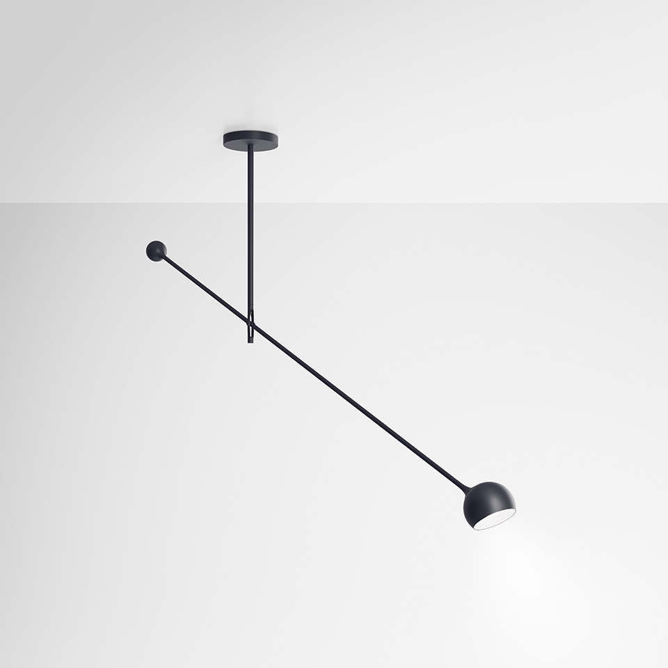 Artemide Ixa ceiling lamp in black, featuring a long diagonal arm with a small spherical head and a counterbalance rod.