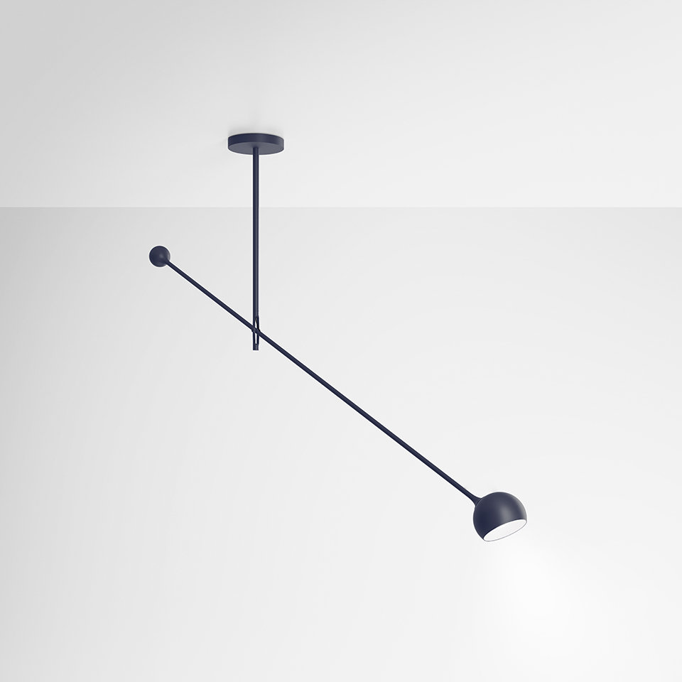 Artemide Ixa ceiling lamp in dark blue, featuring a long diagonal arm with a small spherical head and a dome-shaped directional spotlight