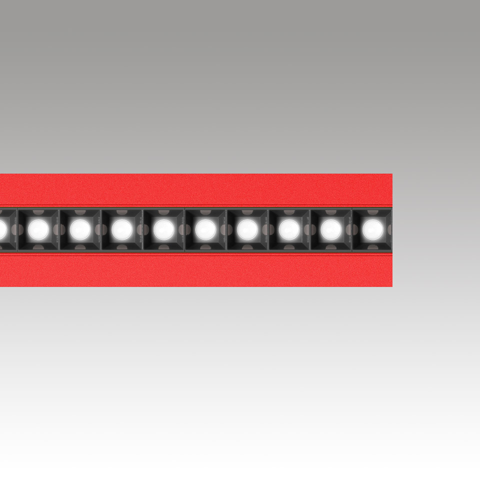 Katà Métron LED linear light bar in red, featuring a row of exposed square LED modules in a black housing