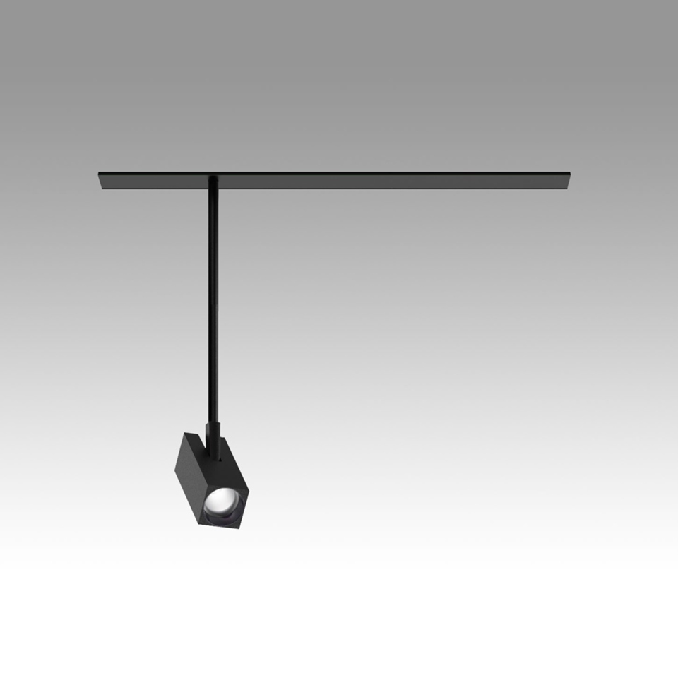 Artemide Katà Métron black track spotlight with cubic head on extended pendant rod, mounted on ceiling rail system