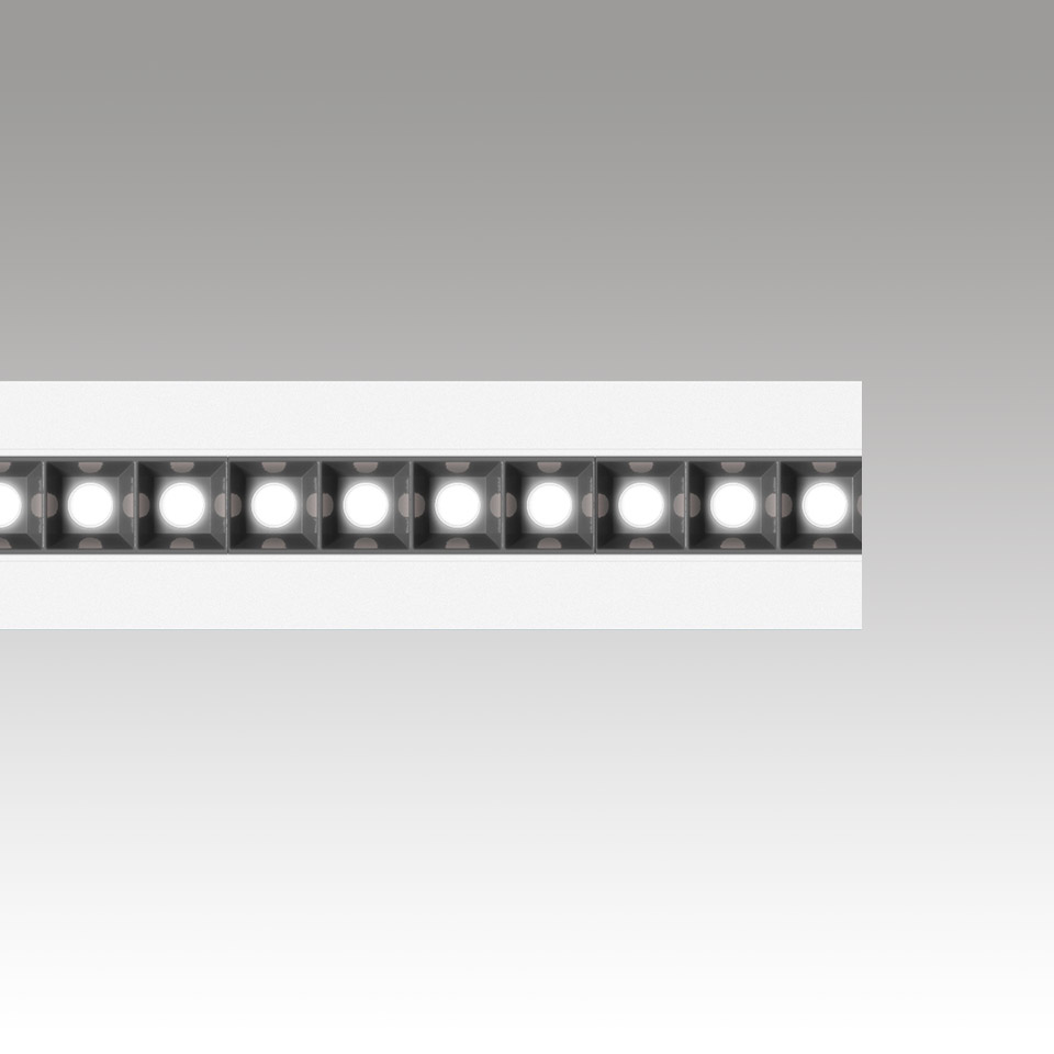 Artemide Katà Métron linear LED fixture with exposed square LED modules in a sleek white aluminum profile, direct light
