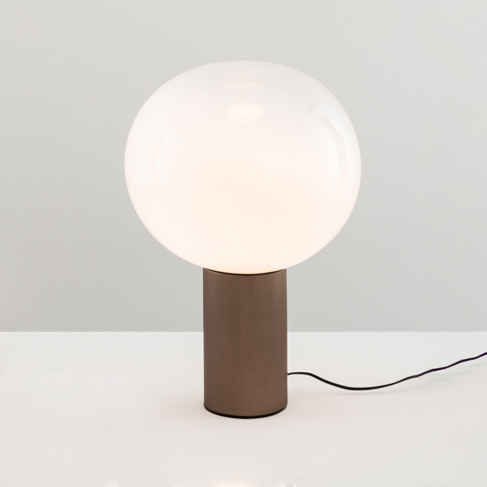 Artemide Laguna Tavolo table lamp: large opal white glass globe shade on a cylindrical brown-taupe metal base with black cord