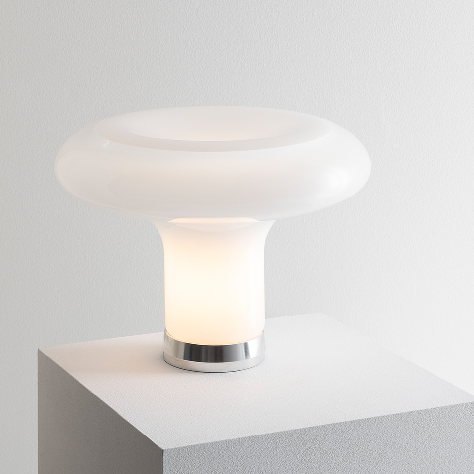 Artemide Lesbo table lamp with opal white blown glass mushroom-shaped diffuser and polished chrome base on white surface