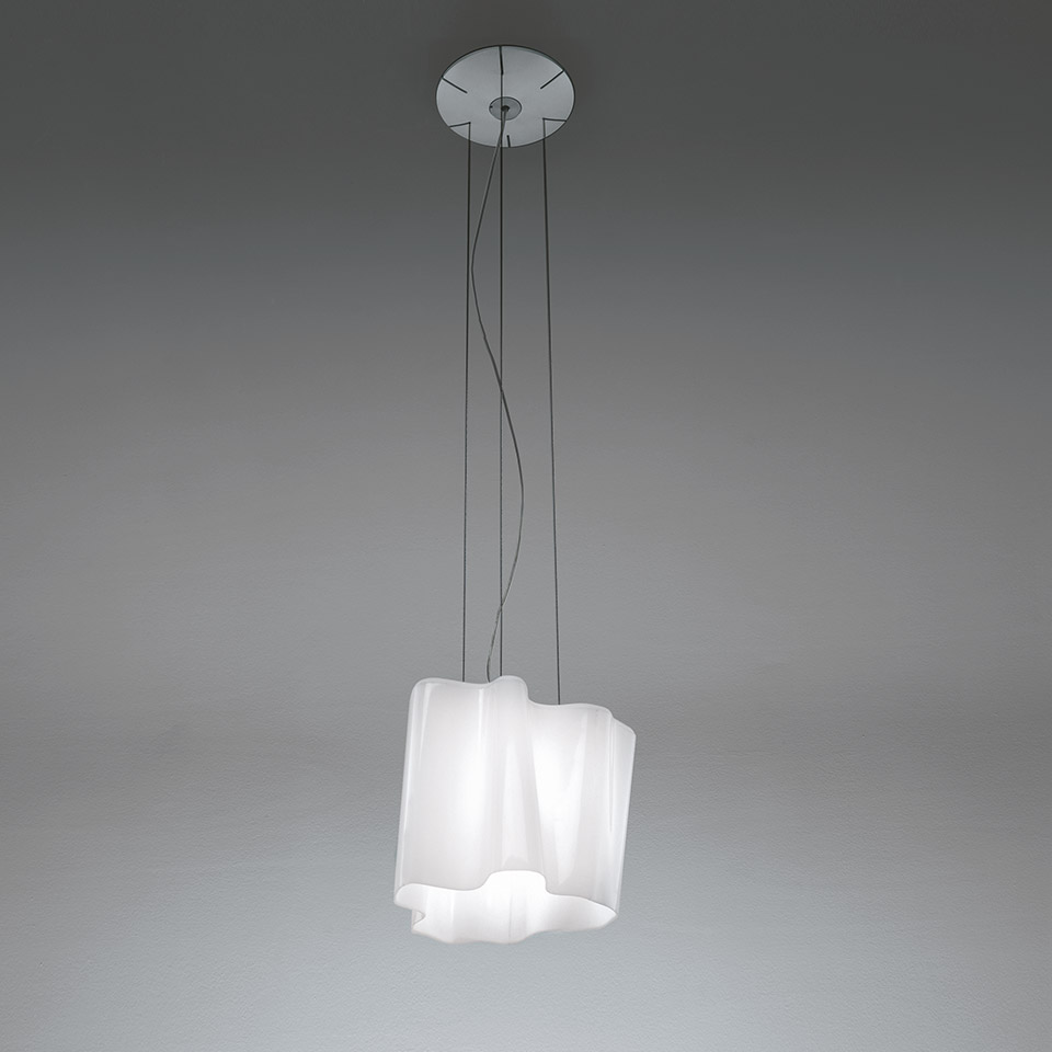 Artemide Logico pendant lamp with white opal diffuser in irregular quadrilateral shape, suspended by two thin cables from a chrome ceiling rose