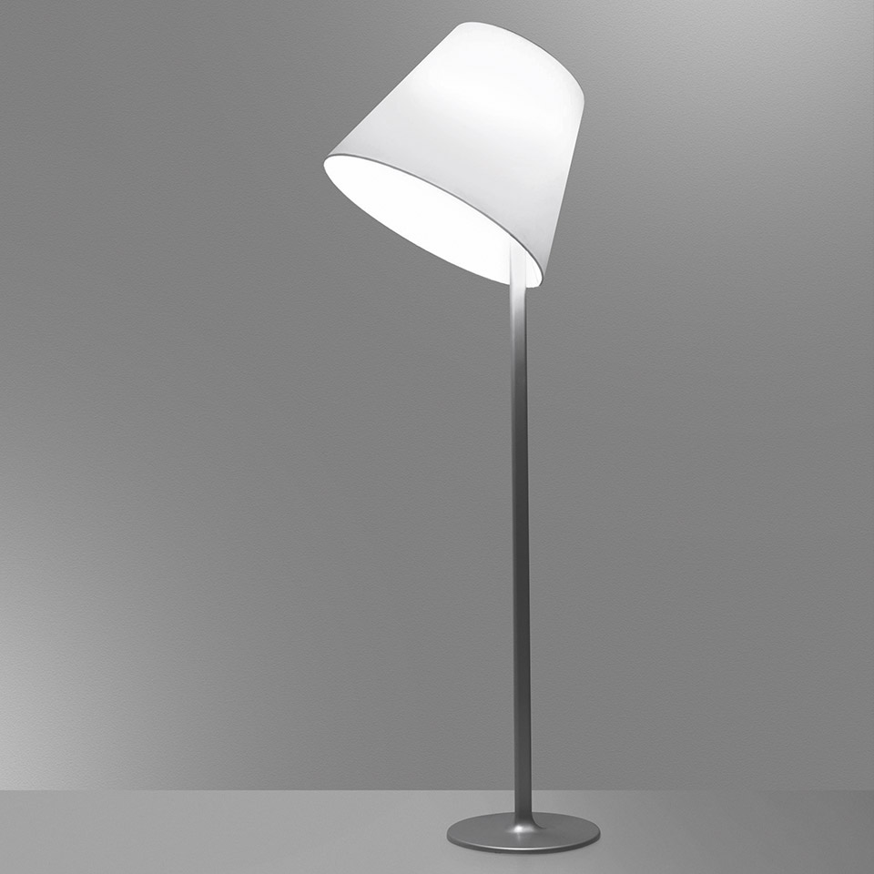 Artemide Melampo Terra floor lamp with tilted white conical shade on a slim grey metal stem and round base