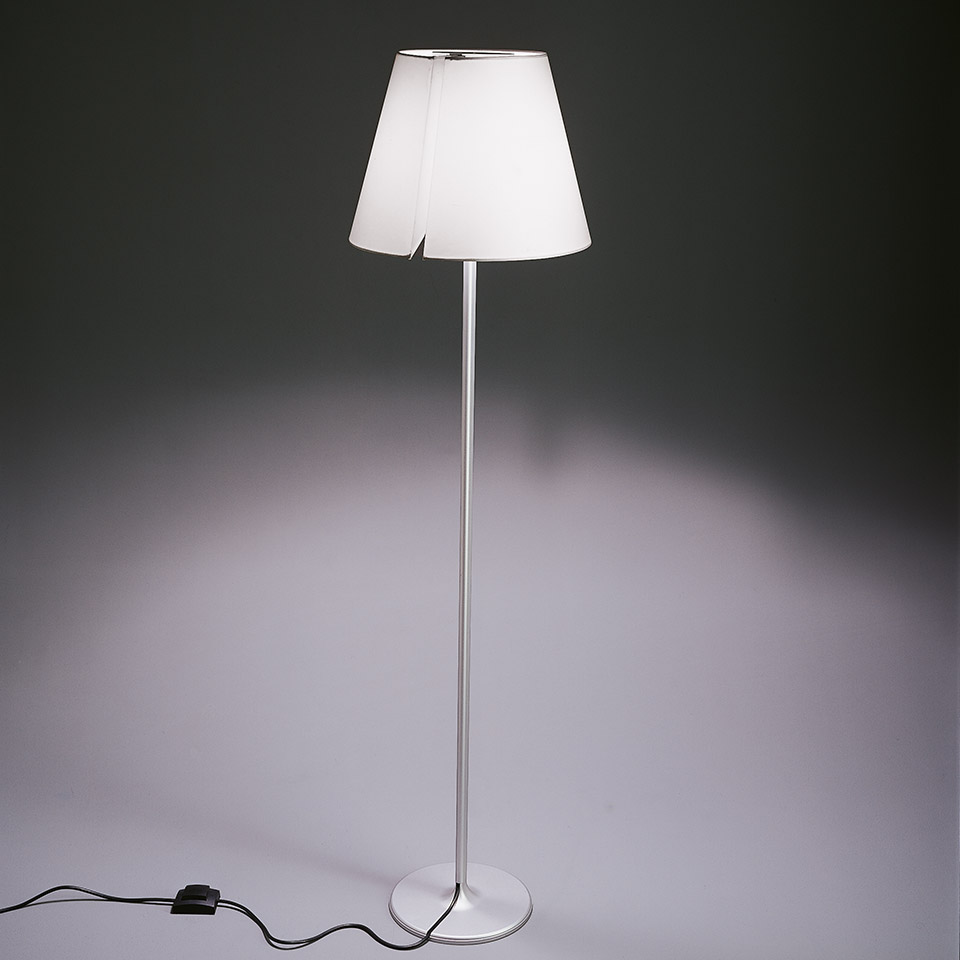 Artemide Melampo Terra floor lamp with white conical fabric shade on a slim aluminum stem and round base