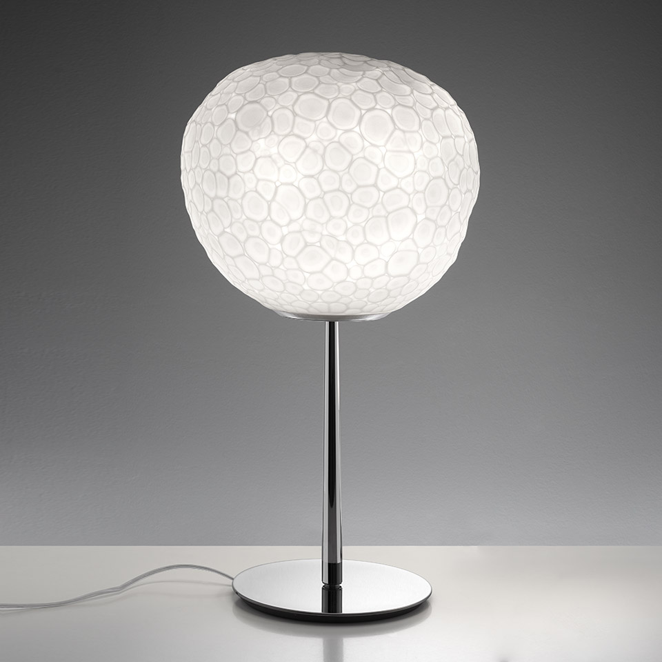 Artemide Meteorite Tavolo table lamp: white blown glass globe shade with organic cell texture on a slim chrome stem and base