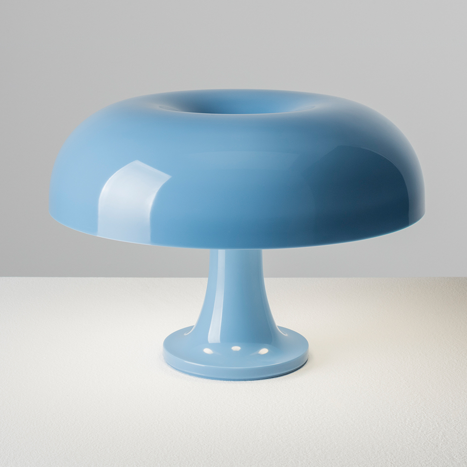 Artemide Nessino table lamp in light blue glossy polycarbonate, featuring iconic mushroom-shaped shade on a slender pedestal base - 2