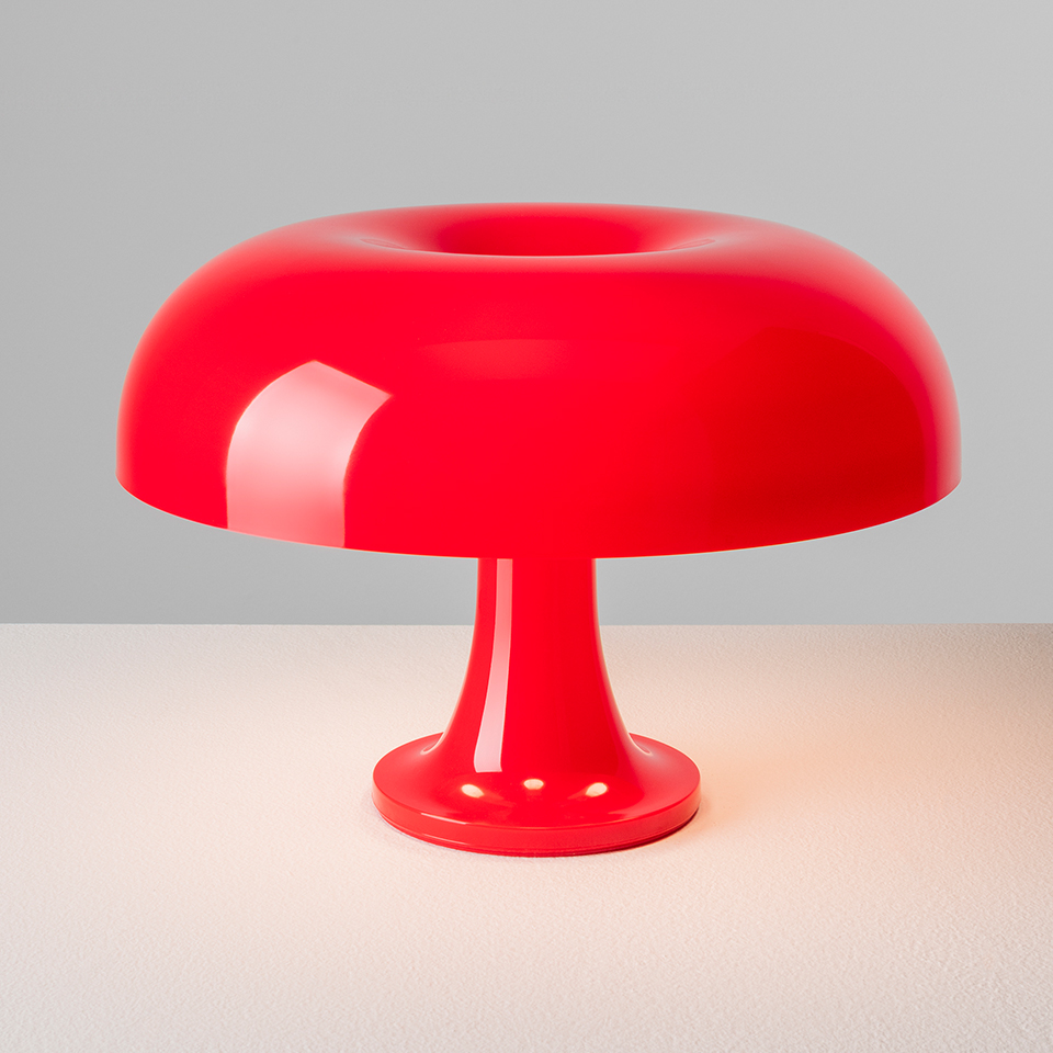 Artemide Nessino table lamp in glossy red, featuring a mushroom-shaped shade with central opening on a trumpet base - 2