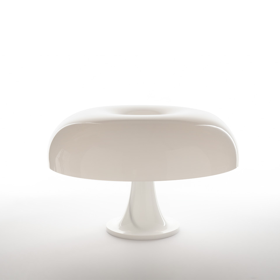Artemide Nesso table lamp in white, featuring iconic mushroom-shaped glossy diffuser on a flared pedestal base