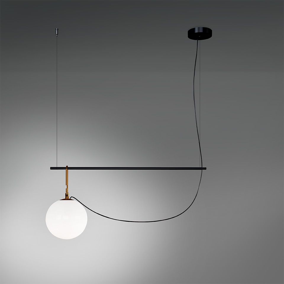 Artemide NH pendant lamp: black horizontal bar with brass fitting, white opaline glass sphere, and curved black cable from ceiling canopy