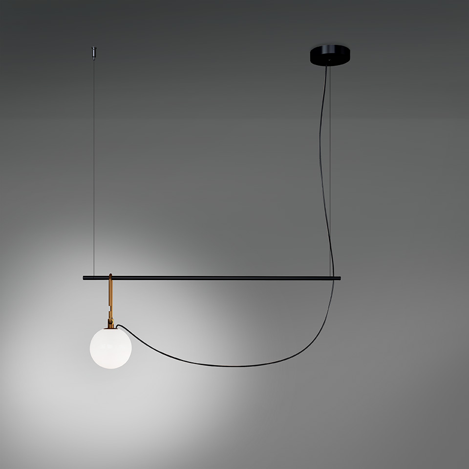 Artemide NH pendant lamp: black horizontal bar with brass joint, white opal glass sphere, and curved black cable from ceiling canopy